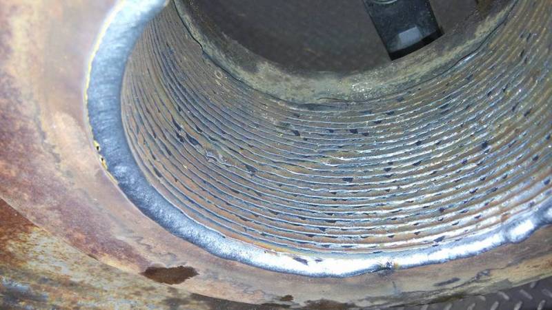 alésage de bagues pour bras de fleche de pelleteuse